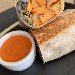 Buena Onda Cafe - Breakfast Burrito with two cage free fried eggs.