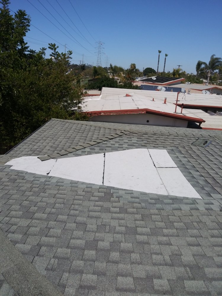 Slide of Father And Son Roofing.
