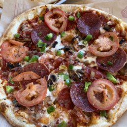 Red Marinara sauce ,pepperoni ,salami ,mushroom ,green pepper ,tomato ,Parmesan, Asiago, mozzarella cheese thin crust
