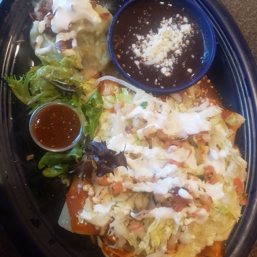 Traditional enchilada plate, pork, steak, chix, cheese. Side of mashed potatoes and spicey salsa. Excellent! Traditional enchilada plate, pork, steak, chix, cheese. Side of mashed potatoes and spicey salsa. Excellent!