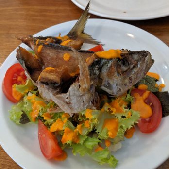 Moon & Turtle - Crispy Akule: whole local big eye scad, endive, red mustard, shaved fennel, tomato, tomato citronette - Seafood Near Me - Hilo, Hawaii