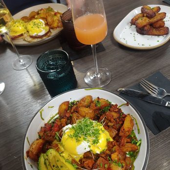Brunch by De Martino - Classic Benny, Hash it Out with Avocado and Chorizo, sweet plantains and Bellini - Latin American Near Me - Somerville, New Jersey