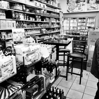 Rosario's - a man in a grocery store - Delis Near Me - Astoria, New York Rosario's - a man in a grocery store - Delis Near Me - Astoria, New York