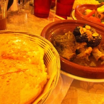 Moroccan Bites - From the left, moroccan bread, lamb shank, and lamb tagine with vegetables - Moroccan Near Me - San Antonio, Texas Moroccan Bites - From the left, moroccan bread, lamb shank, and lamb tagine with vegetables - Moroccan Near Me - San Antonio, Texas