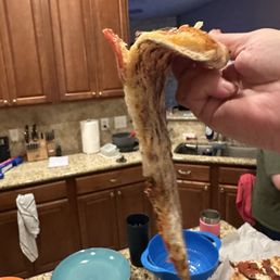 This pie was so under cooked, the dough/crust was soft enough to immediately droop when picked up. This pie was so under cooked, the dough/crust was soft enough to immediately droop when picked up.