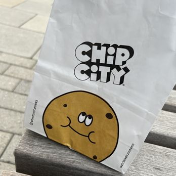 Chip City - bag of chips on a bench - Desserts Near Me - Watertown, Massachusetts Chip City - bag of chips on a bench - Desserts Near Me - Watertown, Massachusetts