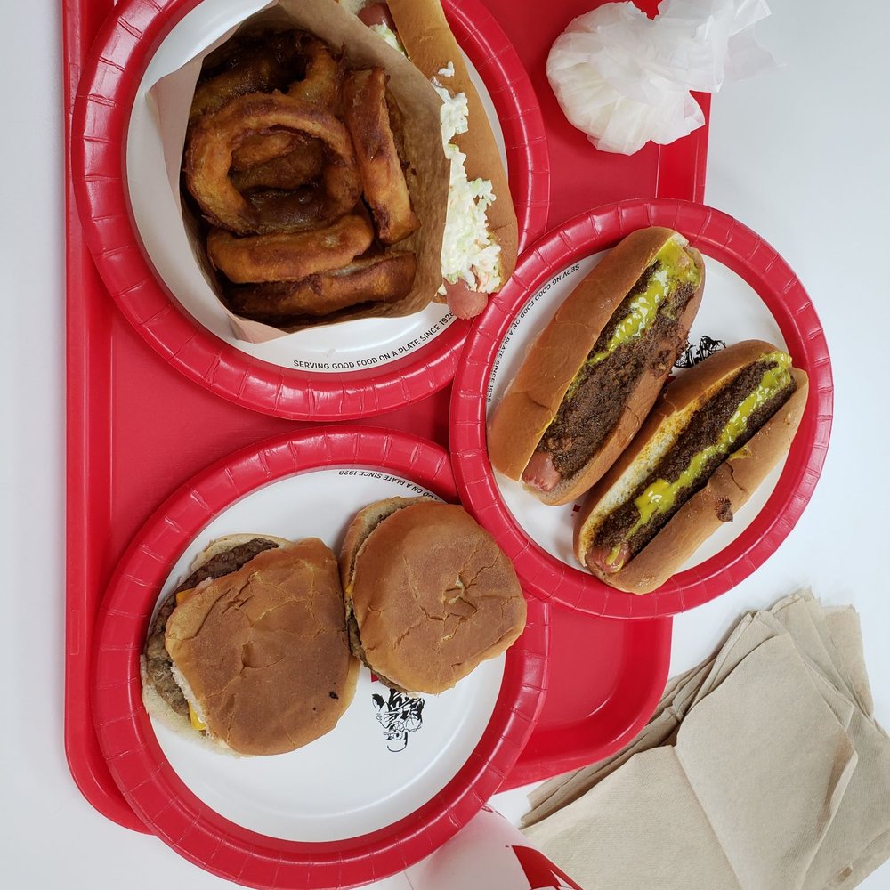 The Varsity - a tray of food including a hot dog, hamburgers and onion rings - Fast Food Near Me - Norcross, Georgia The Varsity - a tray of food including a hot dog, hamburgers and onion rings - Fast Food Near Me - Norcross, Georgia