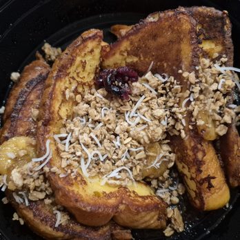 Toasted & Roasted - Bananas foster french toast. Didnt know it came with dried oatmeal, cranberry, and coconut - Breakfast & Brunch Near Me - Henderson, Nevada