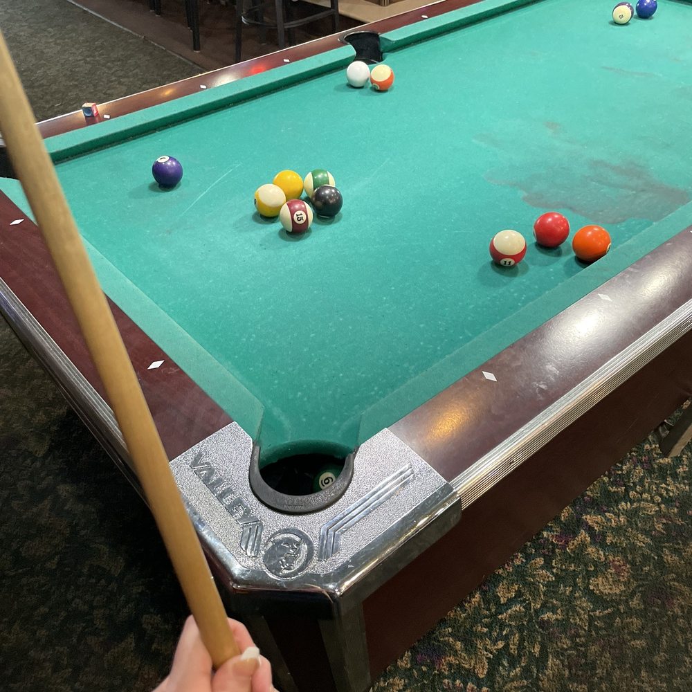 a pool table with balls on it