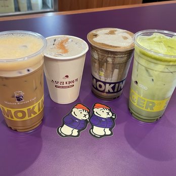 Smoking Tiger Coffee Lab - Left to right: Tiger Latte, Black Frost Latte (seasonal), Black Sesame Hojicha (seasonal), Jeju Matcha Latte - Cafes Near Me - Monterey Park, California Smoking Tiger Coffee Lab - Left to right: Tiger Latte, Black Frost Latte (seasonal), Black Sesame Hojicha (seasonal), Jeju Matcha Latte - Cafes Near Me - Monterey Park, California