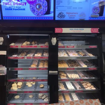 Dunkin' -  a display of donuts in a donut shop - Donuts Near Me - Miami, Florida