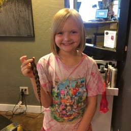 My daughter after stylist Sarah cut off 10 inches for her to donate! So cute My daughter after stylist Sarah cut off 10 inches for her to donate! So cute
