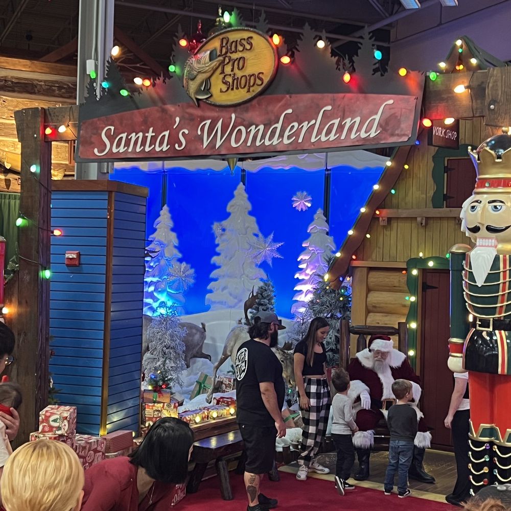 Making the line to see Santa. Our baby girl is too excited