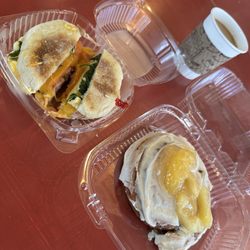The Cookie Mill - Egg Mill Muffin and cinnamon roll with apple on top with a drip coffee