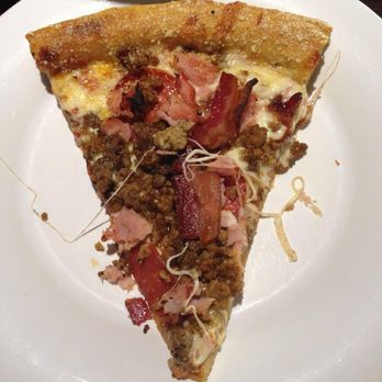 Mellow Mushroom Sanford - Slice of their Mighty Meats pizza. - Pizza Near Me - Sanford, Florida Mellow Mushroom Sanford - Slice of their Mighty Meats pizza. - Pizza Near Me - Sanford, Florida