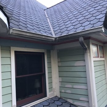 Trusted Veterans Restoration - Gutter repair before - Roofing Near Me