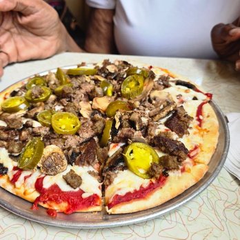 Arcade Restaurant - Build your own pizza 5 ingredients including two meats thin crust was very light and crunchy that I like. - Diners Near Me - Memphis, Tennessee
