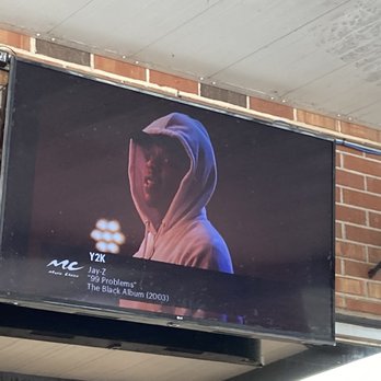 Harvest Moon - Jay Z on the outdoor tv. - Pizza Near Me - Albany, Georgia
