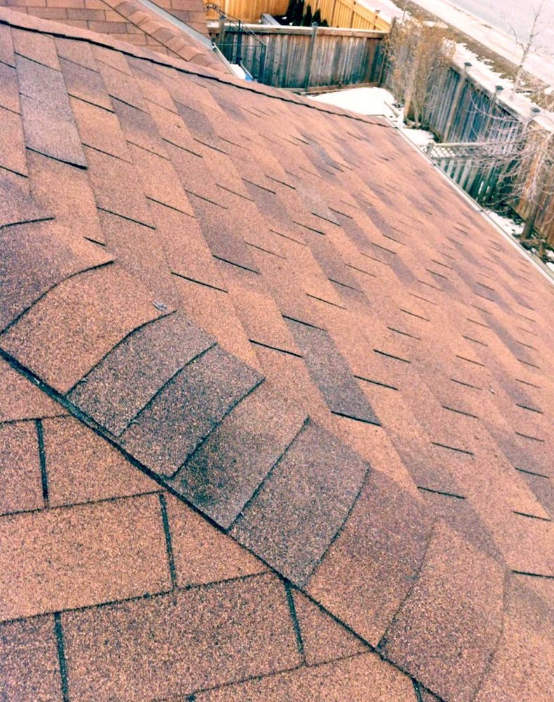 Slide of Lummus Park Roofing