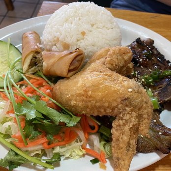 Saigon House - 50CB. Rice Combo Pork Chop, Chicken Wing, Fried egg & Egg roll ( Cm Combo ) No Fried Egg served? - Vietnamese Near Me - San Leandro, California Saigon House - 50CB. Rice Combo Pork Chop, Chicken Wing, Fried egg & Egg roll ( Cm Combo ) No Fried Egg served? - Vietnamese Near Me - San Leandro, California