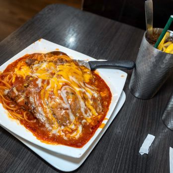 Orchids Cafe - baked pork chop spaghetti $17 - Chinese Near Me - San Francisco, California