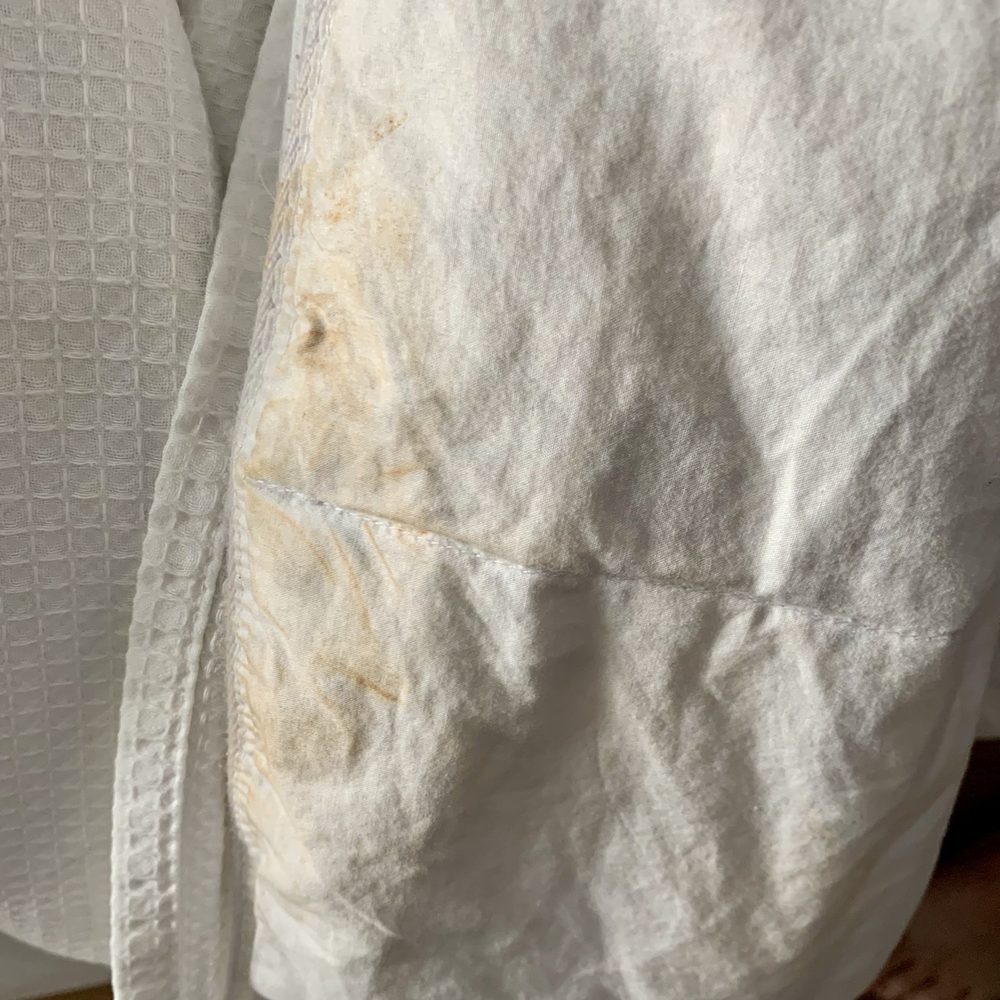 Filthy coverlet that was not replaced. Stain hidden by housekeeping by rotating to foot of bed. Filthy coverlet that was not replaced. Stain hidden by housekeeping by rotating to foot of bed.