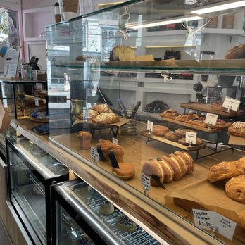 Monaco Cafe - a display of pastries and pastries - Desserts Near Me - Vancouver, British Columbia