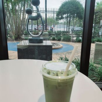 Blind Tiger Coffee Roasters - Matcha Passion Fruit Lemonade with a view of the courtyard - Coffee & Tea Near Me - Tampa, Florida Blind Tiger Coffee Roasters - Matcha Passion Fruit Lemonade with a view of the courtyard - Coffee & Tea Near Me - Tampa, Florida