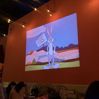 Scarlett - Movies/shows playing in the patio area - Italian Near Me - West Hollywood, California