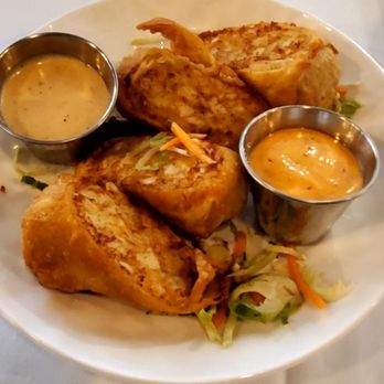 Papi Cuisine - Crab cake egg rolls sauce on the side. - Cocktail Bars Near Me - Baltimore, Maryland Papi Cuisine - Crab cake egg rolls sauce on the side. - Cocktail Bars Near Me - Baltimore, Maryland