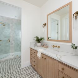 Sea Pointe Design & Remodel - Guest Bathroom remodel designed and built by Sea Pointe with farmhouse design