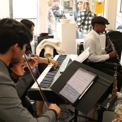 OCFA Showcase Gallery - Musical entertainment at opening reception of "Around the World" exhibition.