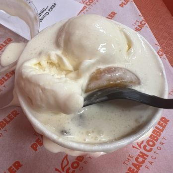 The Peach Cobbler Factory - PEACH COBBLER with ice cream on top (listen to them and get it in a separate cup) - Desserts Near Me - Richmond, Texas