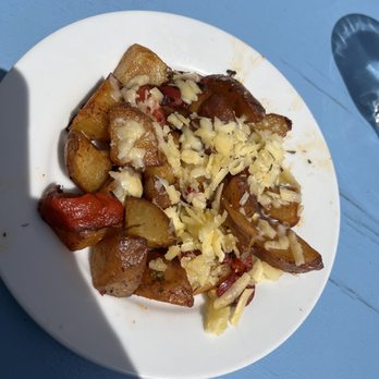 Harbor Breakfast - A side of home fries topped with a sharp white cheddar! Has red peppers in them which adds amazing flavor - Diners Near Me - San Diego, California Harbor Breakfast - A side of home fries topped with a sharp white cheddar! Has red peppers in them which adds amazing flavor - Diners Near Me - San Diego, California