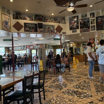 The Money Pit Drive Thru - Inside view, plenty of seating, great for big groups. - Fast Food Near Me - San Marcos, California The Money Pit Drive Thru - Inside view, plenty of seating, great for big groups. - Fast Food Near Me - San Marcos, California
