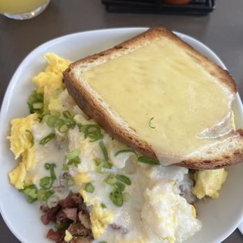 Lucy's - Sy's Breakfast Pot Pie with Brioche - Coffee & Tea Near Me - Grand Rapids, Michigan Lucy's - Sy's Breakfast Pot Pie with Brioche - Coffee & Tea Near Me - Grand Rapids, Michigan