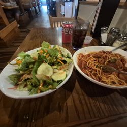Spaghetti with Sausage and the House Garden Salad with Raspberry Vinegaret and a Coke!