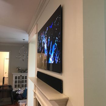 Bay Area AV - A beautiful above fireplace Samsung Frame installation that prioritizes a flush-mount look. - TV Mounting Near Me