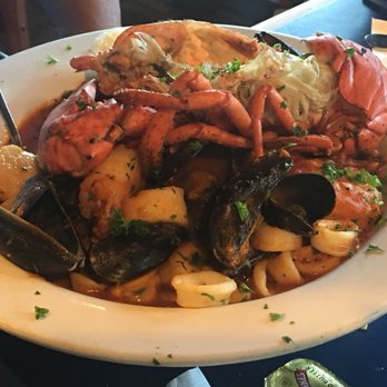 Boston Sail Loft - Diablo has lobster, scallops, calamari, mussels on a spicy marinara linguini - Bars Near Me - Boston, Massachusetts