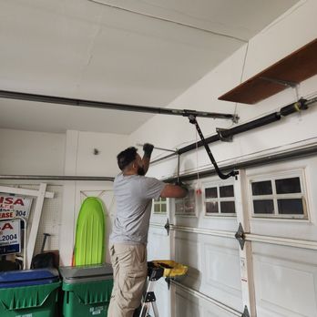Express Garage & Gate Services - Omer is installing the springs. - Garage Door Services Near Me - Costa Mesa, California