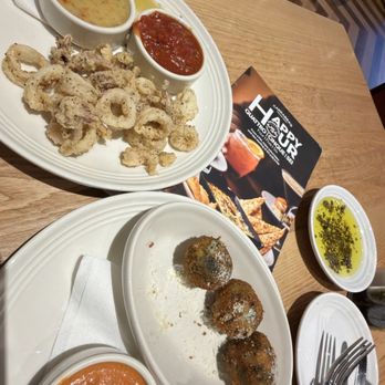 Carrabba's Italian Grill - Spinach arancini $5 and calamari $9 - Italian Near Me - Sanford, Florida