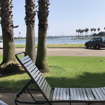 Bahia Resort Hotel - Our staycation view from our patio room. Woke up and got to go straight to the beach to get some sand and water on our feet first thing! - San Diego, CA