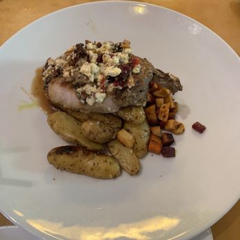 Mythos Restaurant - Pork chop - New American Near Me - Orlando, Florida Mythos Restaurant - Pork chop - New American Near Me - Orlando, Florida