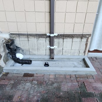 Alpha Structural - a drain in the corner of a building - General Contractors Near Me - Sunland, California Alpha Structural - a drain in the corner of a building - General Contractors Near Me - Sunland, California