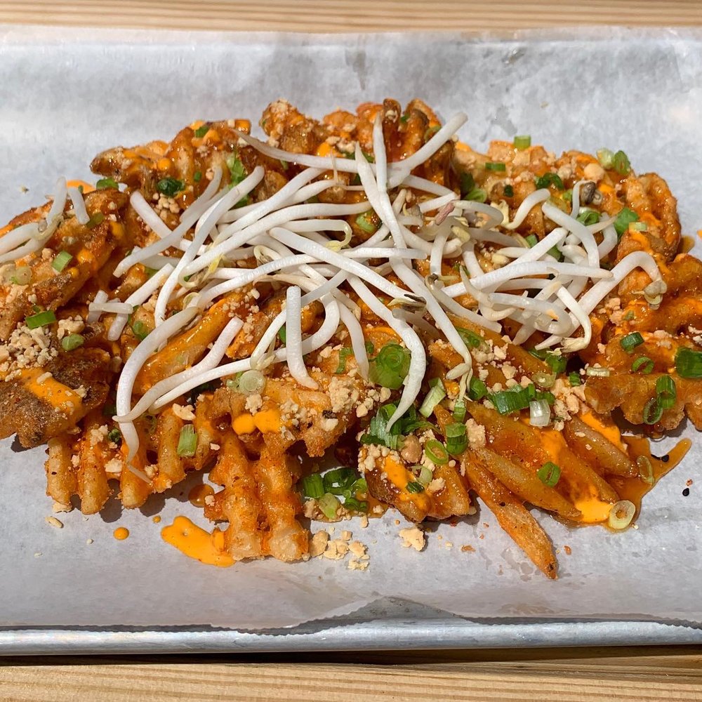 Lil Dumplings Noodle Bar - Pad Thai waffle fries with tamarind, sprouts, scallion, and peanuts - Ramen Near Me - Indianapolis, Indiana Lil Dumplings Noodle Bar - Pad Thai waffle fries with tamarind, sprouts, scallion, and peanuts - Ramen Near Me - Indianapolis, Indiana