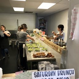 Workers busy prepping food.