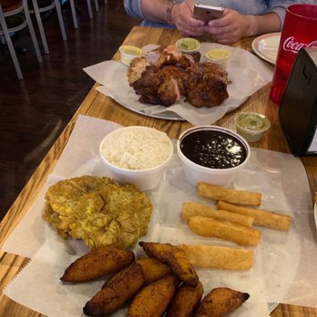 Mochica - Maduro, tostones, yuca fries, blk beans, rise and pollo ala brasa (peruvian chicken) - Peruvian Near Me - Concord, North Carolina Mochica - Maduro, tostones, yuca fries, blk beans, rise and pollo ala brasa (peruvian chicken) - Peruvian Near Me - Concord, North Carolina