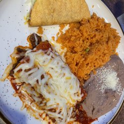 Mucho Bueno Mexican Street Food & Tequila - 2 Red beef enchiladas, hard beef taco, beans and rice.