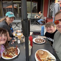 Outdoor patio, eating on a Friday morning. Huge portions on our breakfast.