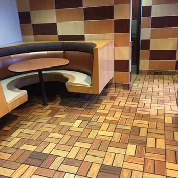 McDonald's - a corner seating area in a restaurant - Burgers Near Me - Webster City, Iowa